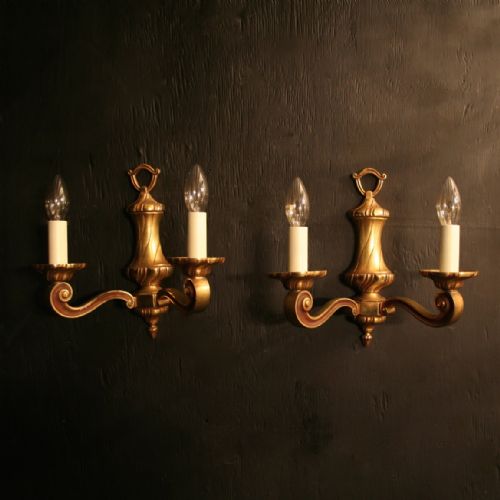 A French Pair of Bronze Antique Wall Lights