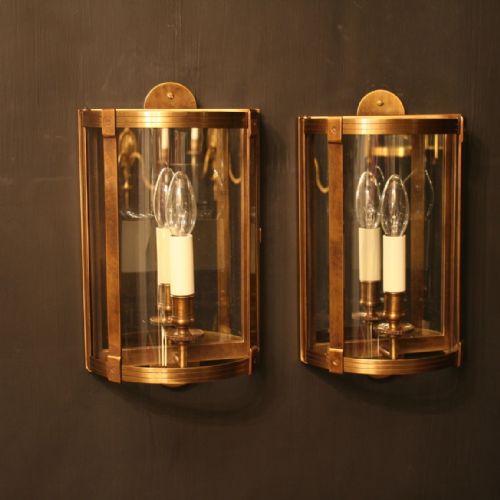 A French Pair of Bronze Half Wall Lanterns