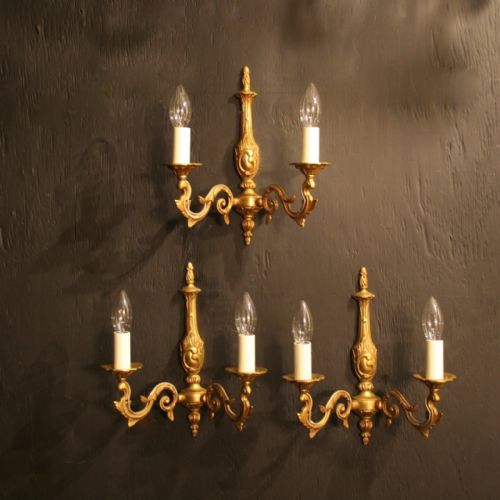 A French Set of Three Gilded Twin Arm Antique Wall Lights
