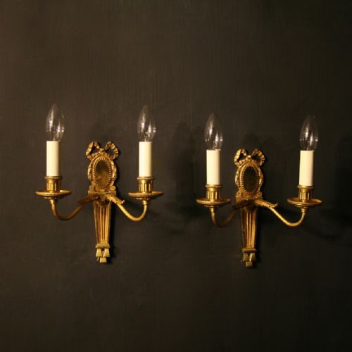 A French Pair of Bronze Twin Arm Antique Wall Lights