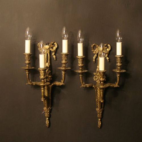 A French Pair of Bronze Triple Arm Antique Wall Sconces