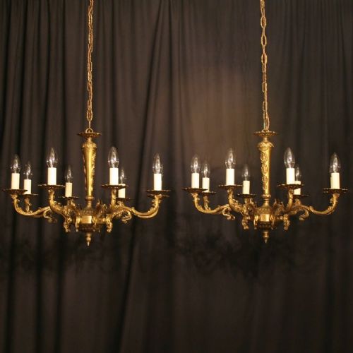 A French Pair of Gilded 8 Light Chandeliers
