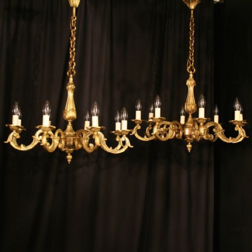 A French Pair of Gilded Bronze 8 Light Chandeliers