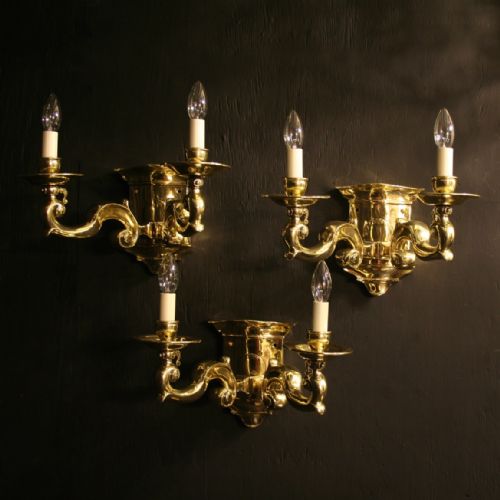 An English Set of Three Farady & Son Brass Antique Wall Lights