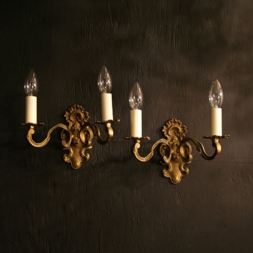 A French Pair of Brass Twin Arm Antique Wall Lights