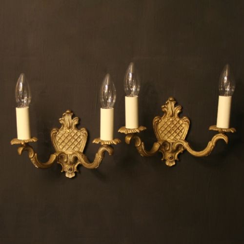 A French Pair of Bronze Antique Wall Lights