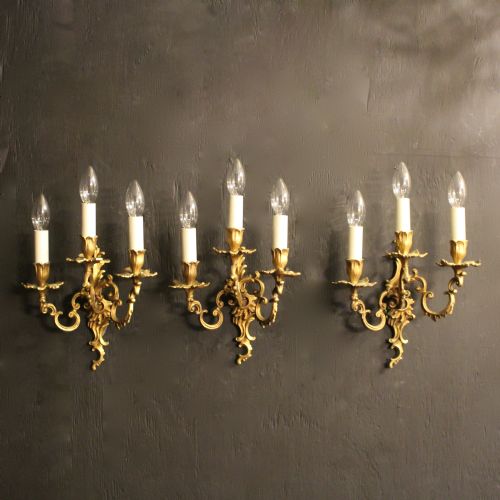A French Set of 3 Gilded Triple Arm Antique Wall Lights