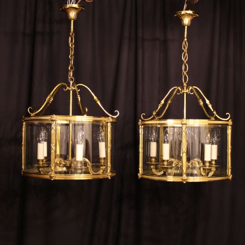 A French Pair of Bronze Gilded 5 Light Convex Lanterns