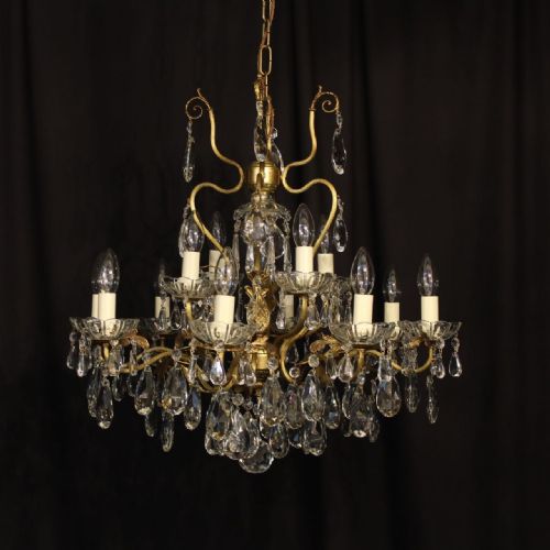 An Italian 13 Light Double Tiered Gilded Antique Chandelier