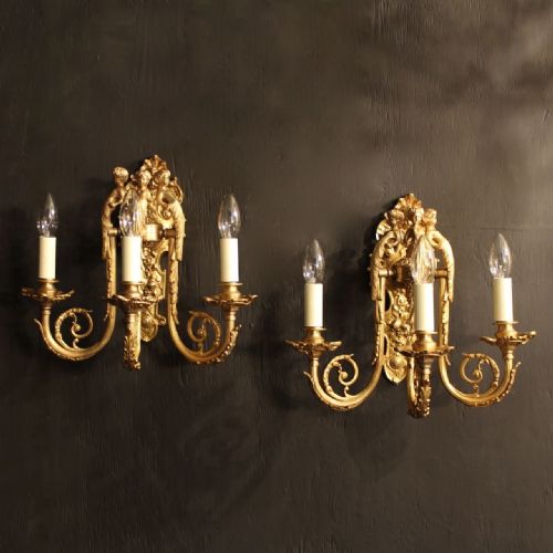 A French Pair of Triple Arm Cherub Wall Lights