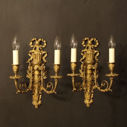 A French Pair of Bronze Antique Wall Sconces