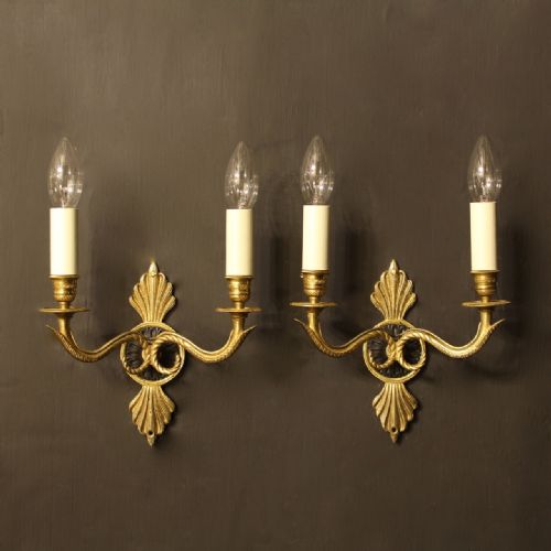 A French Pair of Empire Gilded Wall Lights