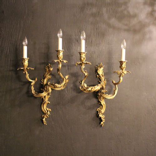 A French Pair of Bronze Antique Wall Sconces
