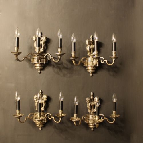 An English Set of 4 Cherub Silver Wall Lights