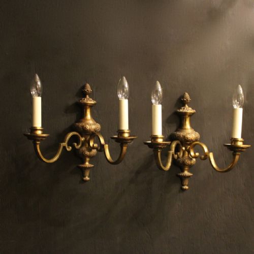 An English Pair of Twin Arm Bronze Antique Wall Lights