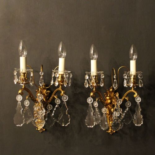 A French Pair of Bronze Antique Wall Lights