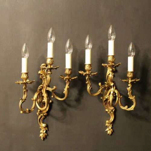 A French Pair of Gilded Triple Arm Wall Lights