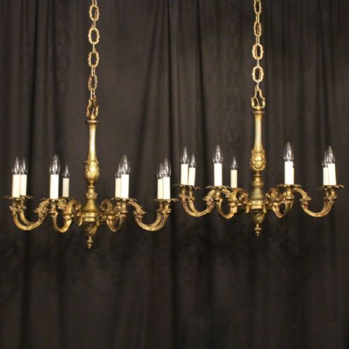A French Pair of Bronze 8 Light Chandeliers