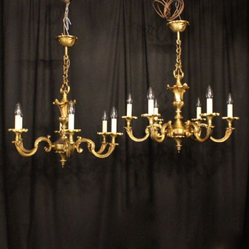 A French Pair of Gilded Bronze 6 Light Chandeliers