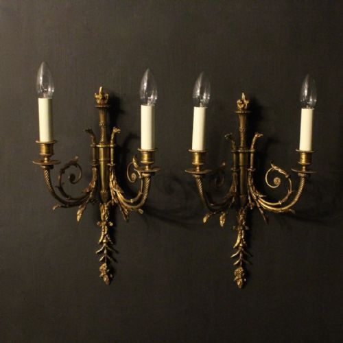 A French Pair of Bronze Antique Wall Lights