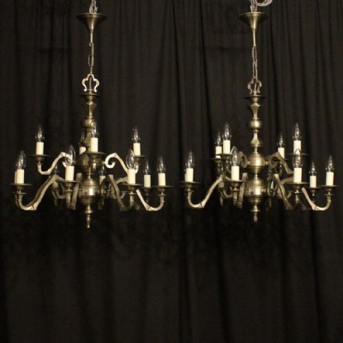 Flemish Pair Silver 12 Light Chandeliers