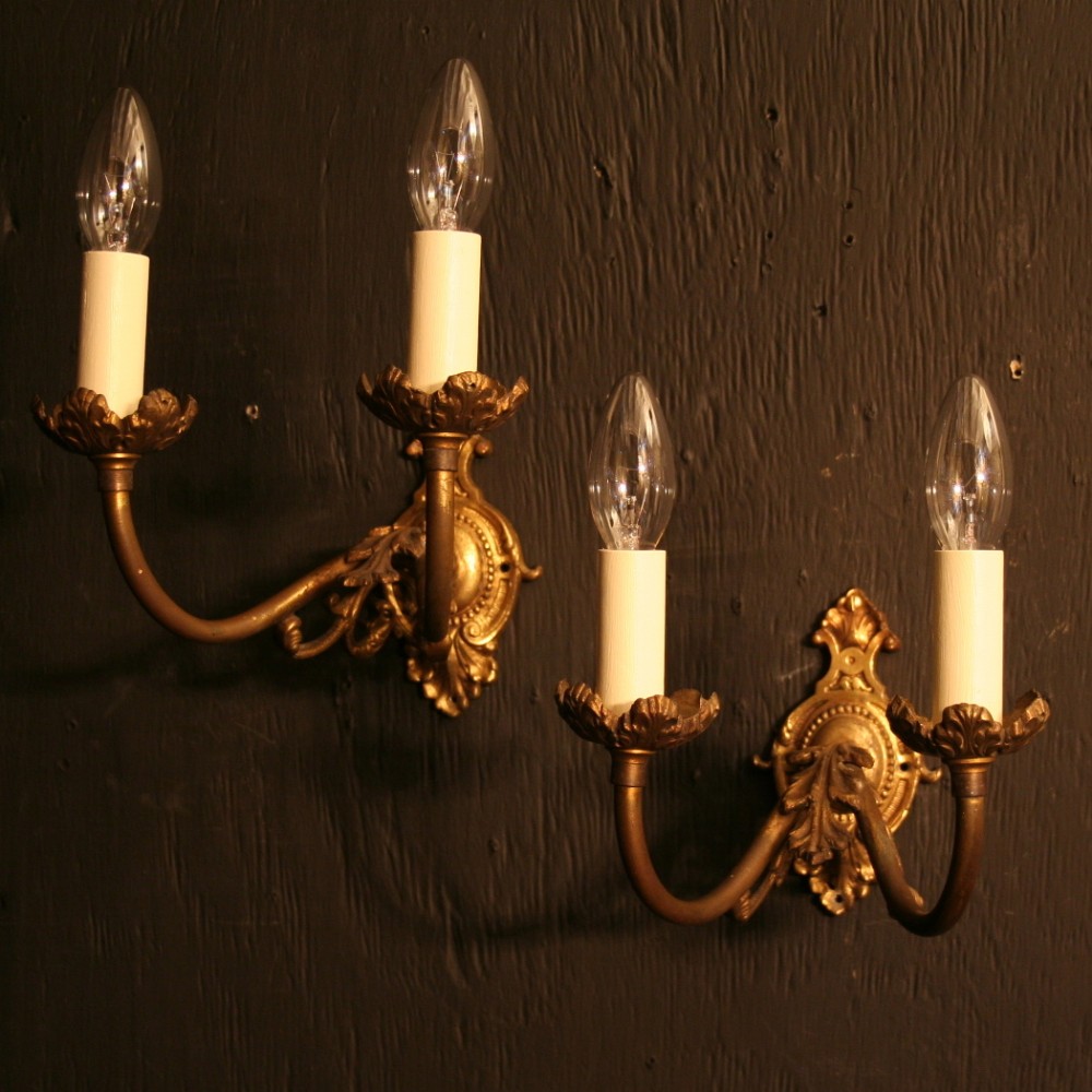 A French Pair Of Gilded Antique Wall Lights