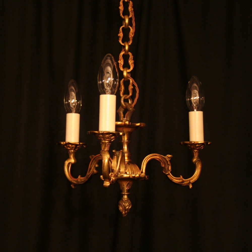 A French Gilded Triple Light Antique Chandelier