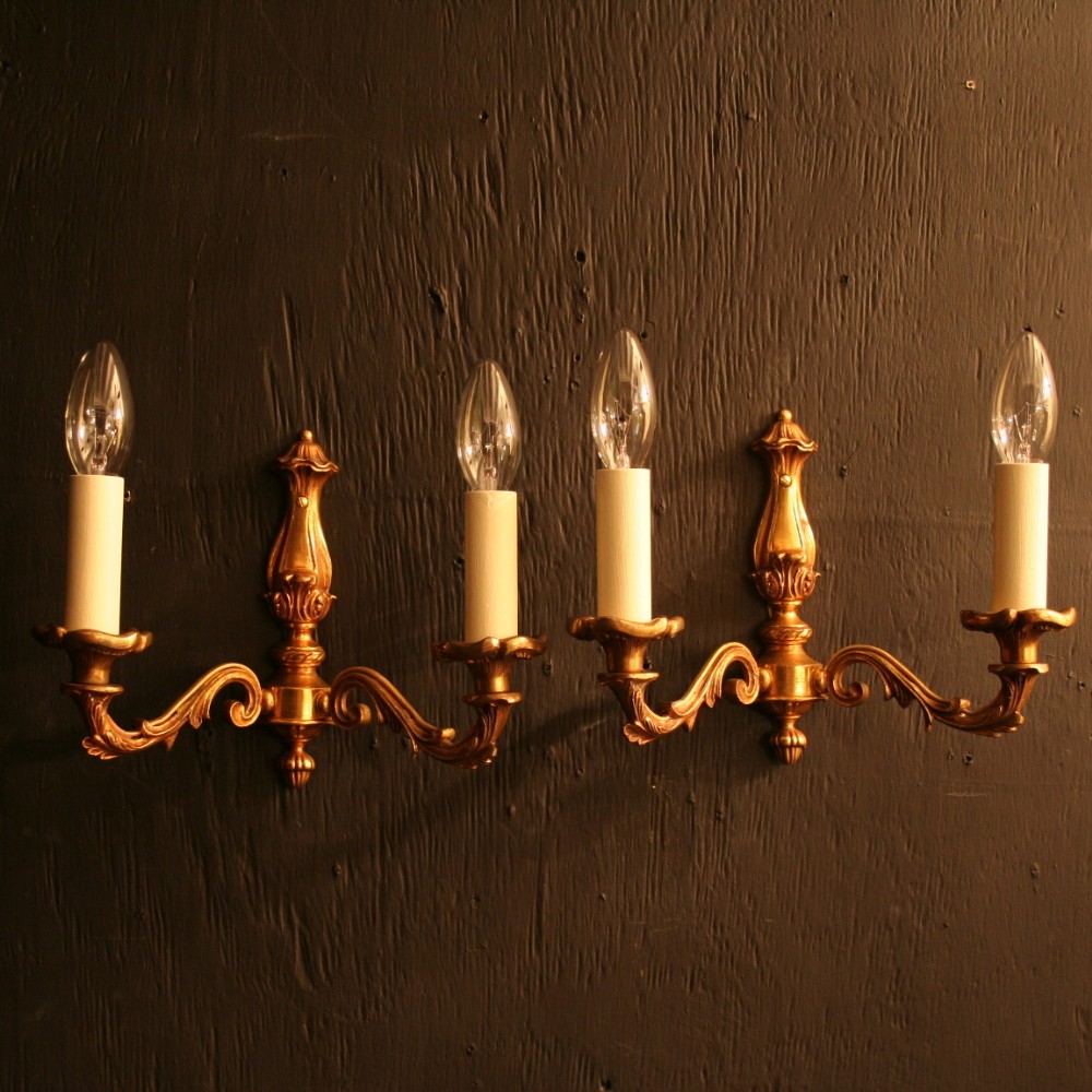 A French Pair Of Gilded Antique Wall Lights