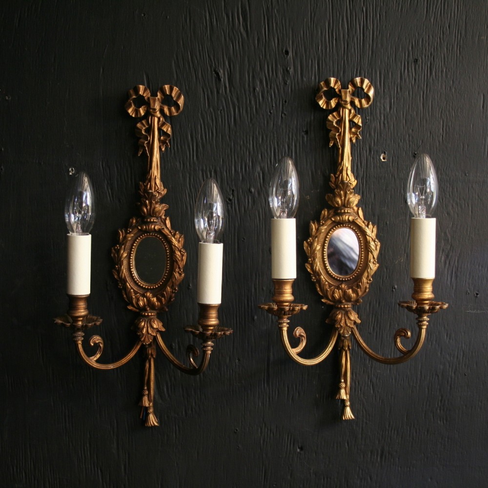 A French Pair Of Gilded Antique Wall Lights