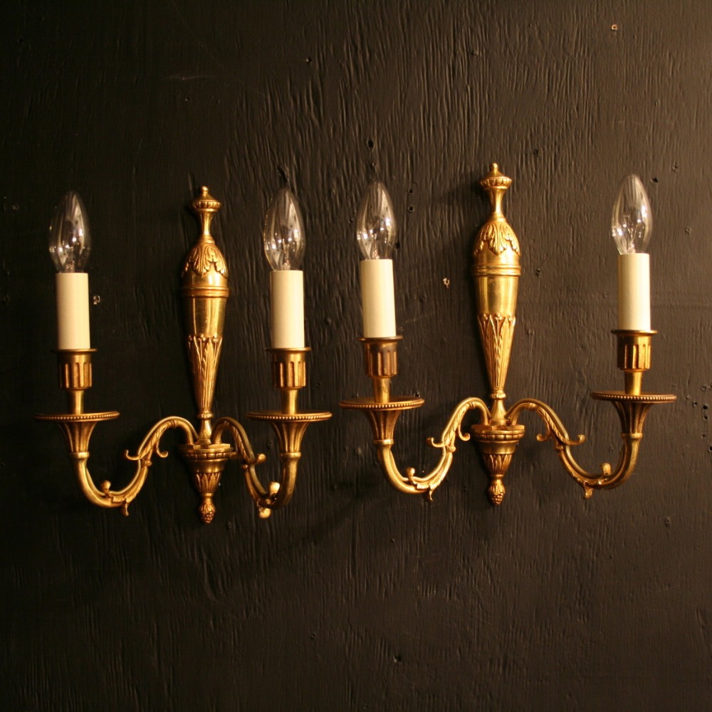 A French Pair Of Gilded Antique Wall Lights