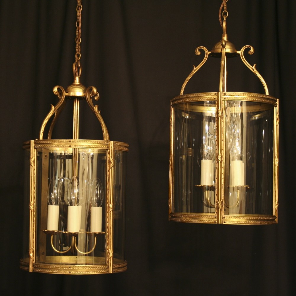 A French Pair Of Gilded Antique Hall Lanterns