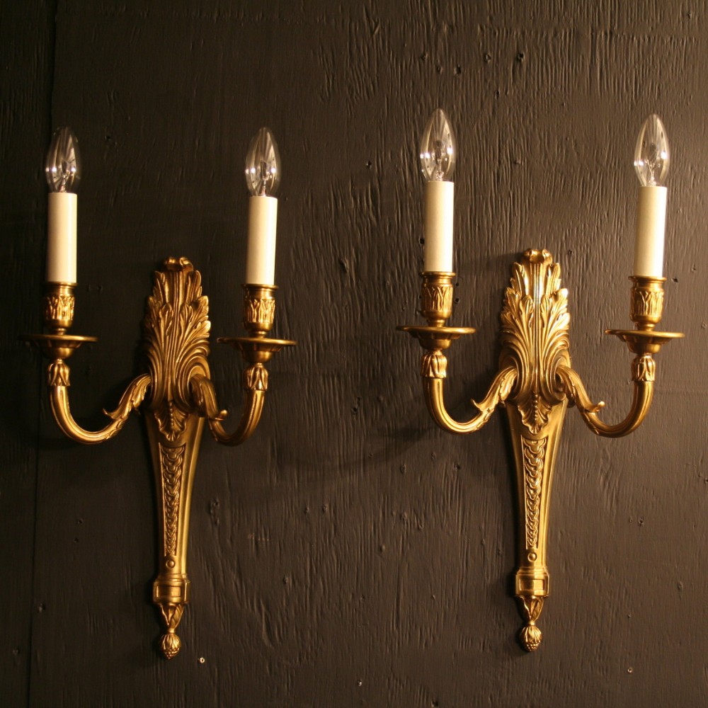 A French Pair Of Gilded Antique Wall Lights