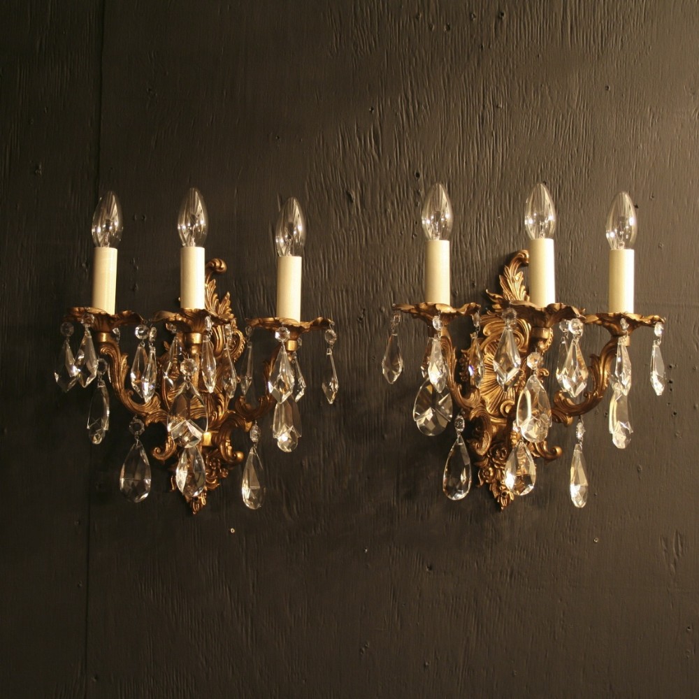An Italian Pair Of Triple Arm Antique Wall Lights