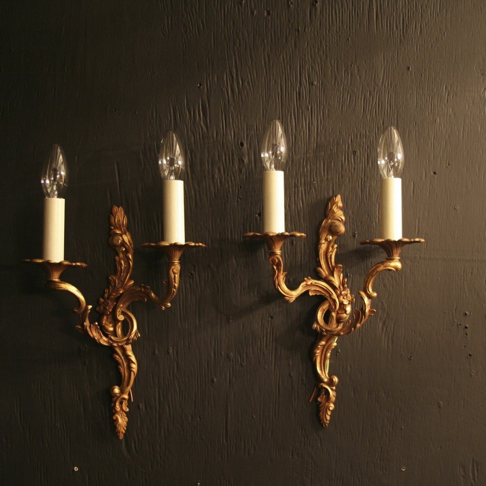 A French Pair Of Gilded Antique Wall Lights