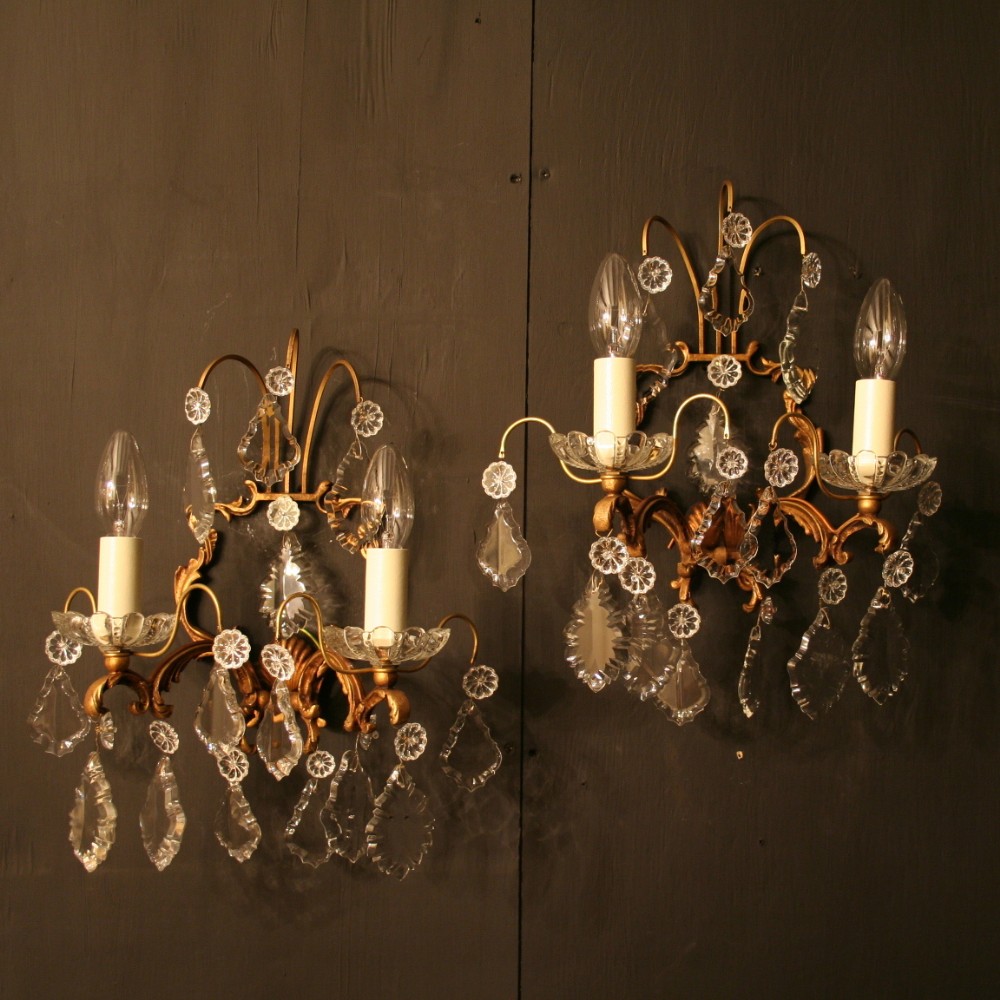 A French Pair Of Gilded Antique Wall Lights