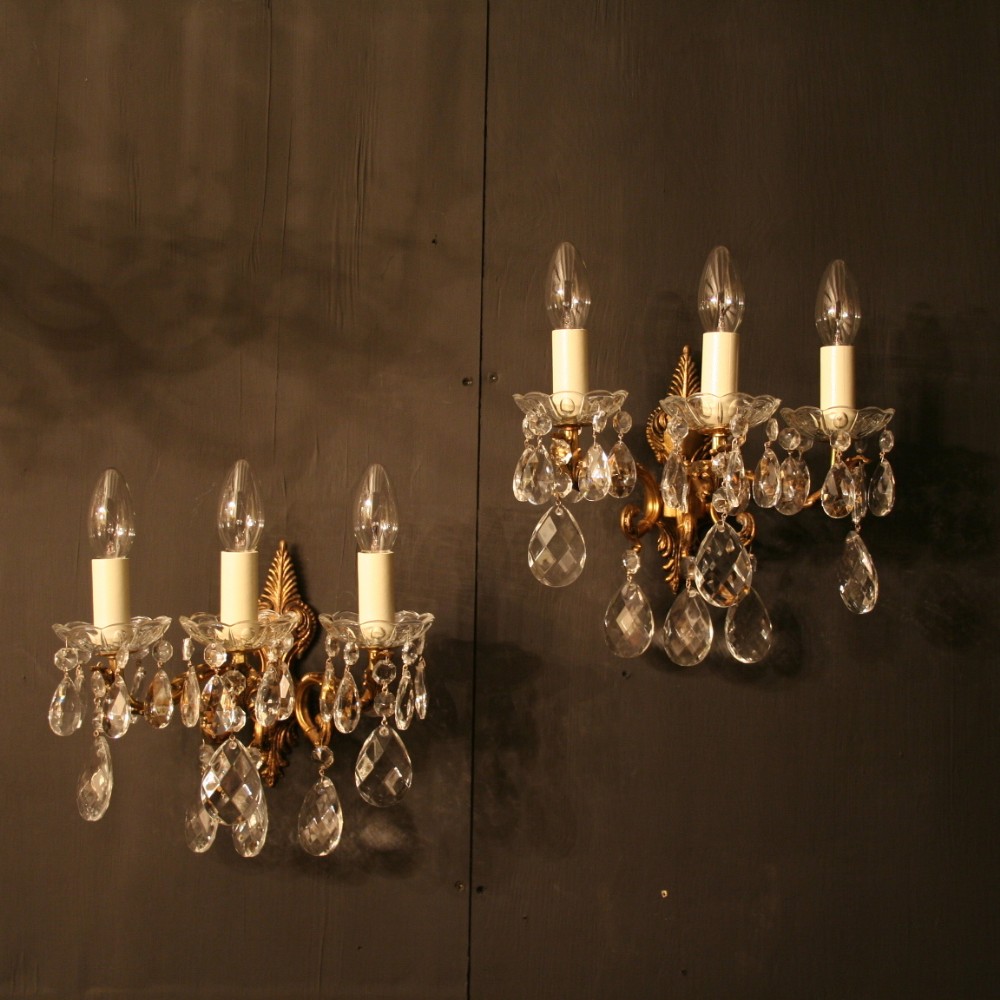 An Italian Pair Of Triple Arm Antique Wall Lights