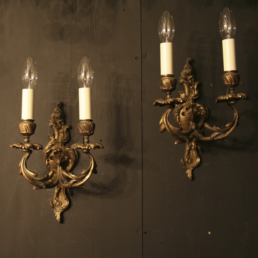 A French Pair Of Gilded Antique Wall Sconces