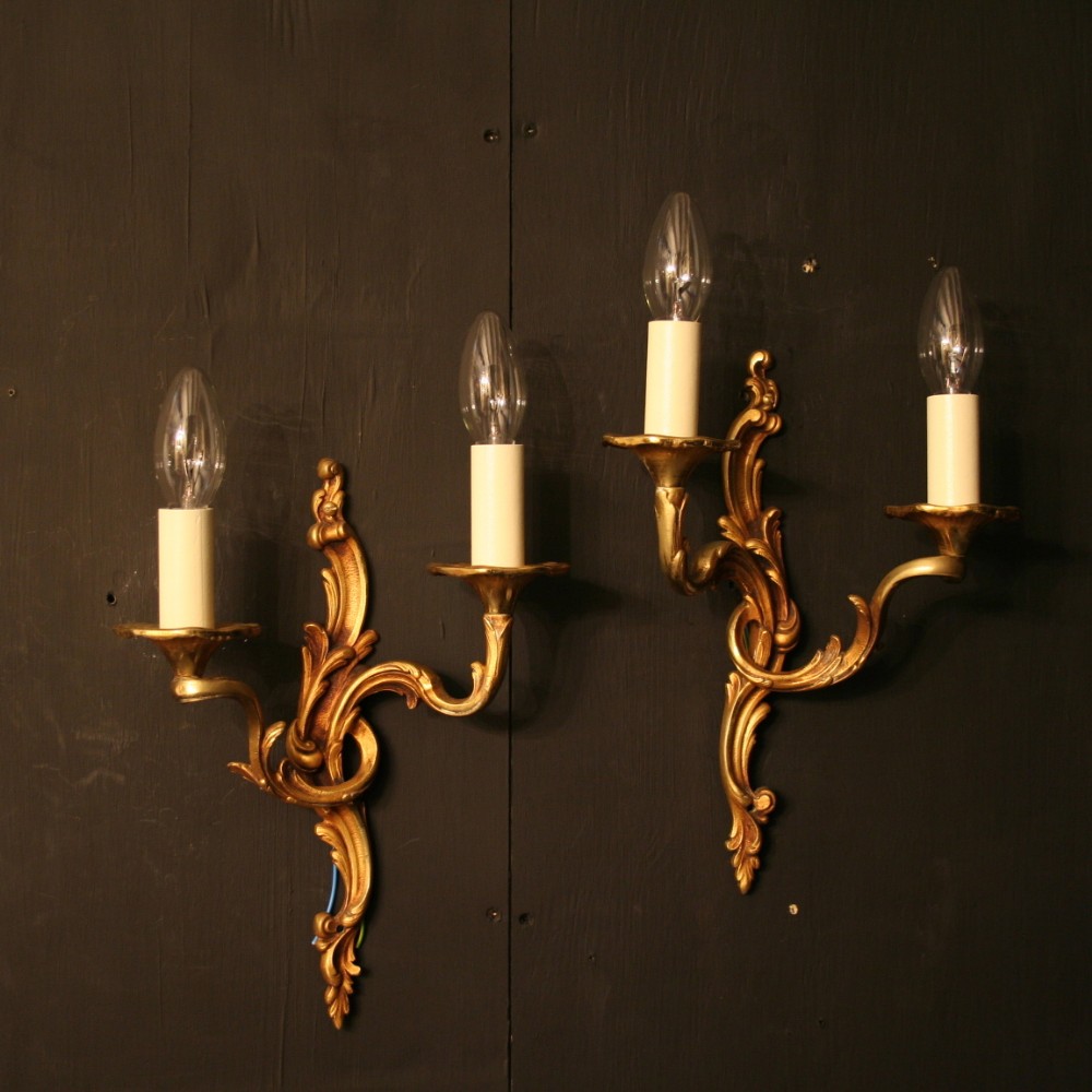 A French Pair Of Gilded Antique Wall Lights