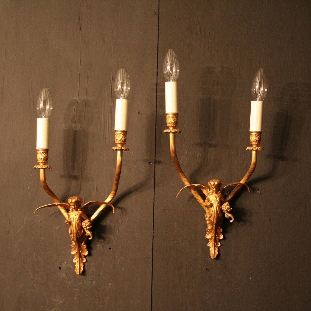 A French Pair Of Twin Arm Antique Wall Lights