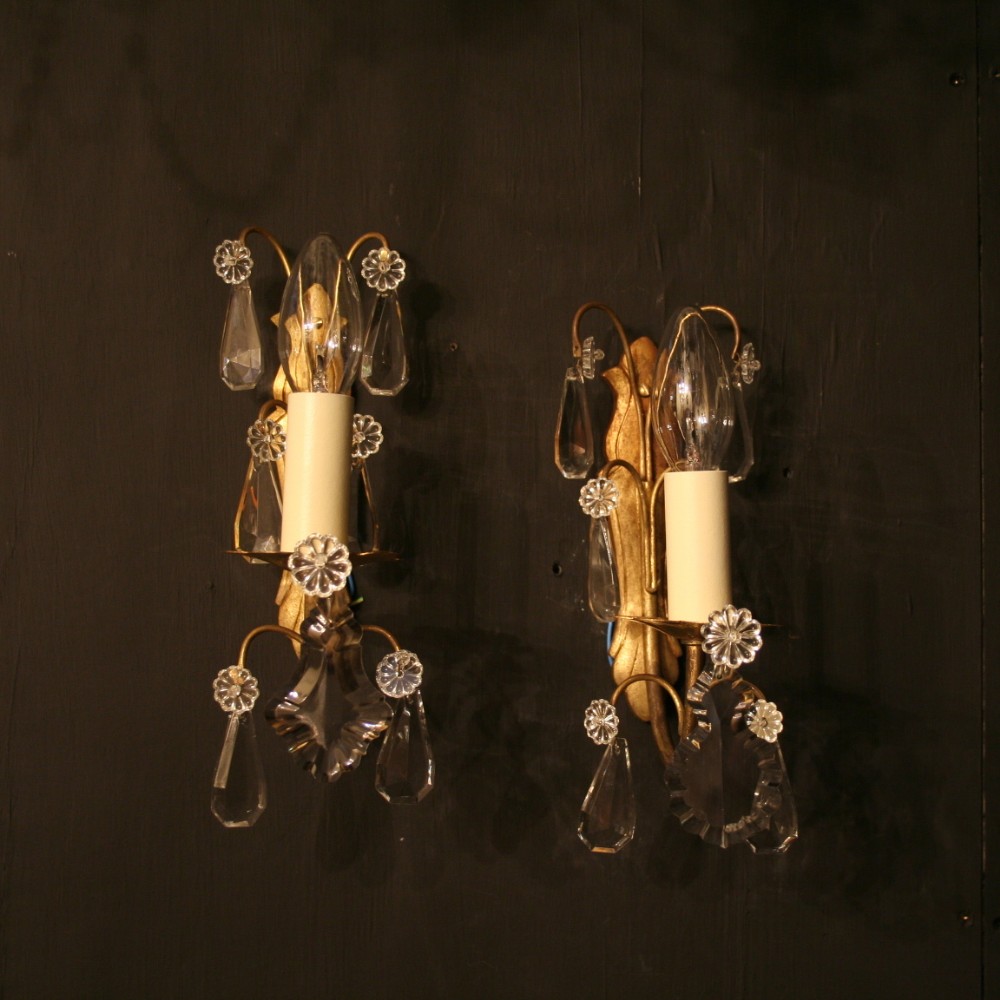 A French Pair Of Single Arm Antique Wall Lights