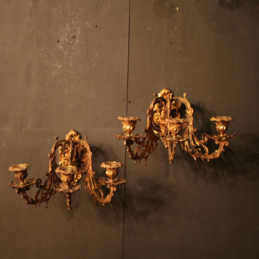 A French Pair Of Gilded Antique Wall Sconces