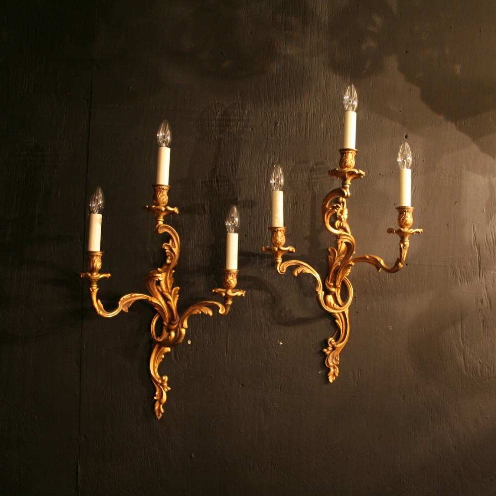 A Large French Pair Of Gilded Antique Wall Lights