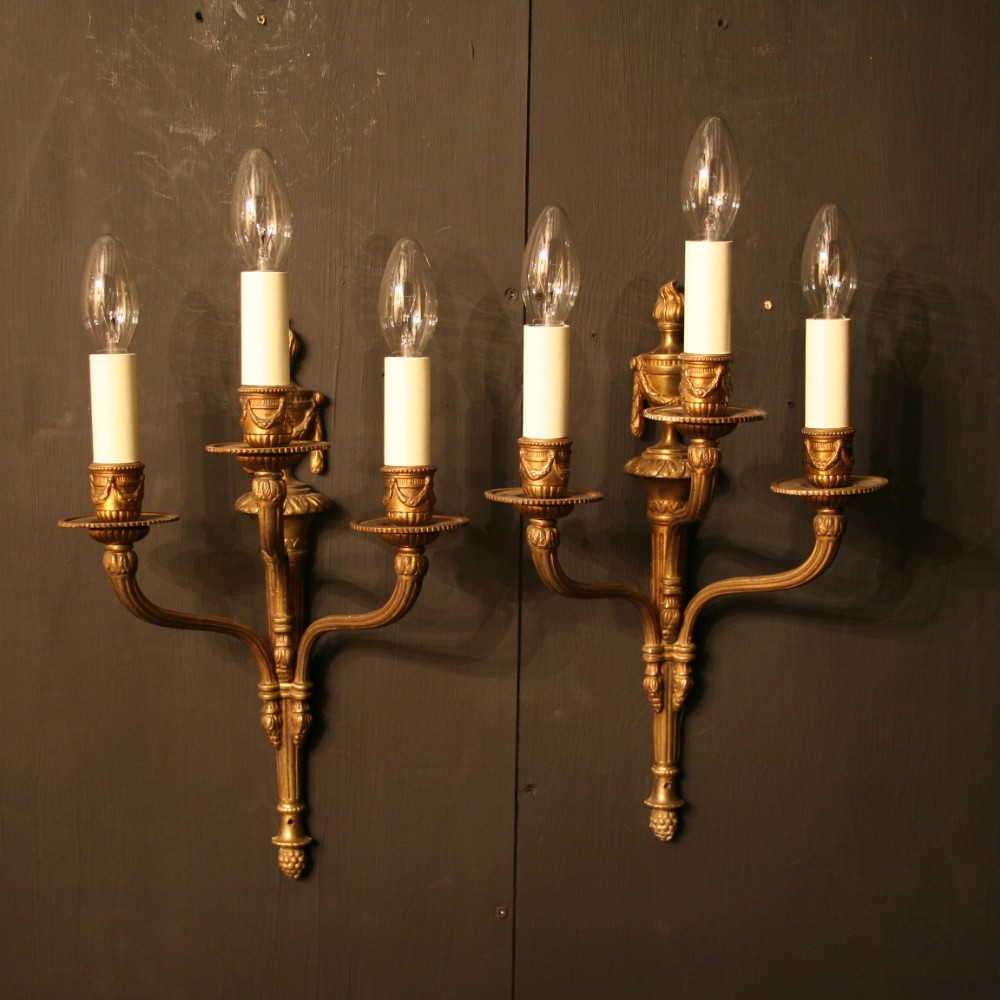 An English Pair Of Gilded Cast Brass Antique Wall Lights