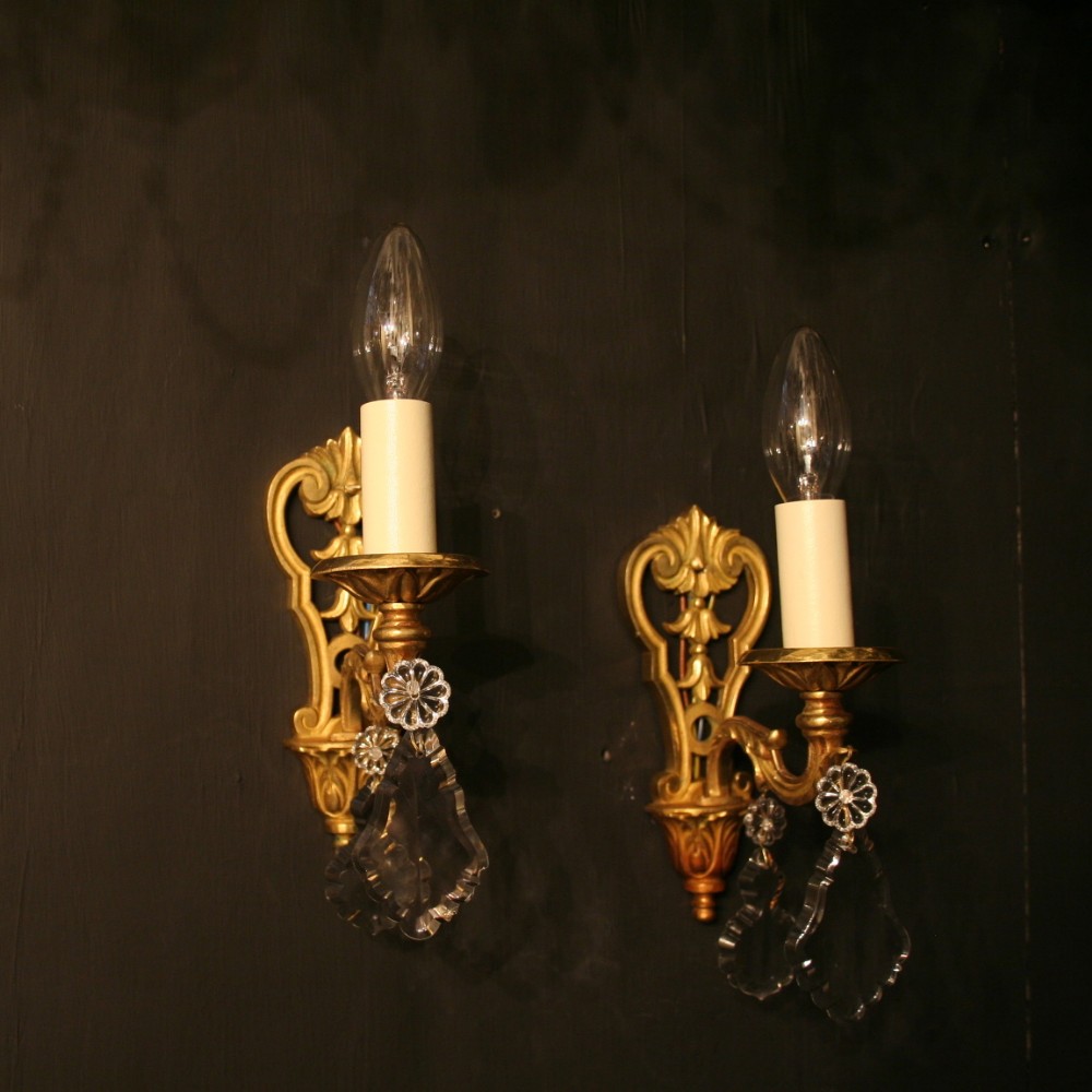 A French Pair Of Single Arm Antique Wall Lights