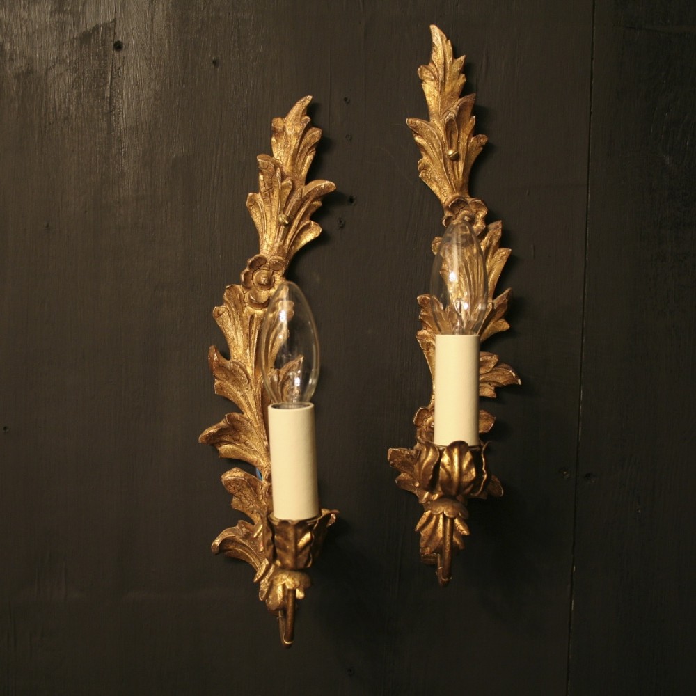 An Italian Pair Of Single Arm Antique Wall Lights