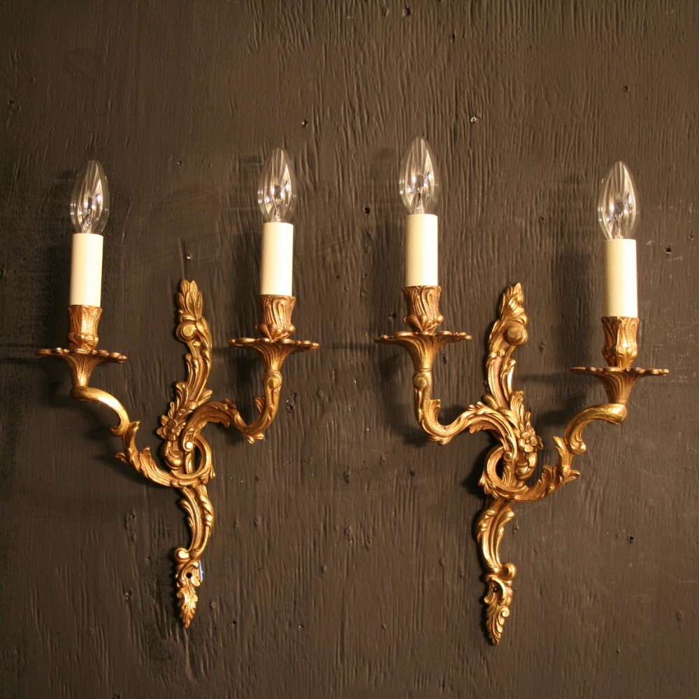 A French Pair Of Gilded Antique Wall Lights