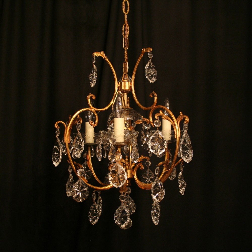 A French Gilded Cast Brass 4 Light Antique Chandelier