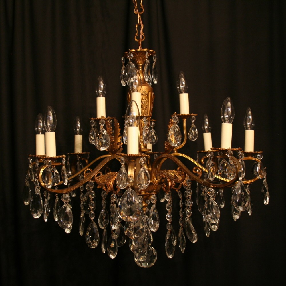 An Italian Gilded Cast Brass 12 Light Double Tiered Antique Chandelier