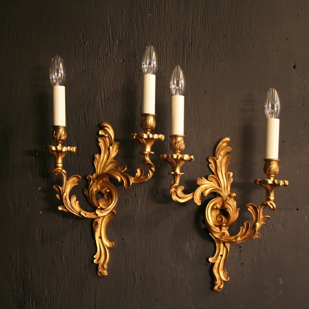 A French Pair Of Gilded Antique Wall Lights