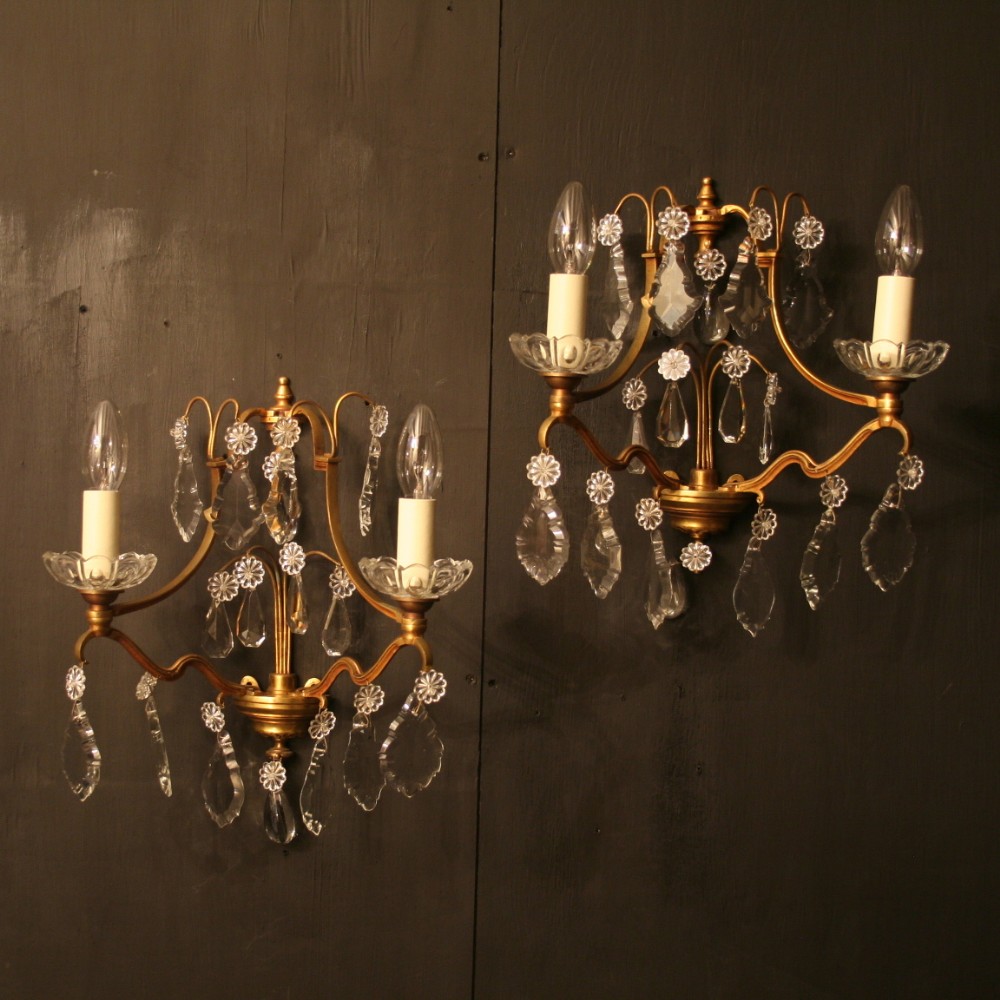 A French Pair Of Gilded Antique Wall Lights